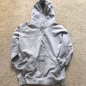 Cream Addidas hoodie with back text